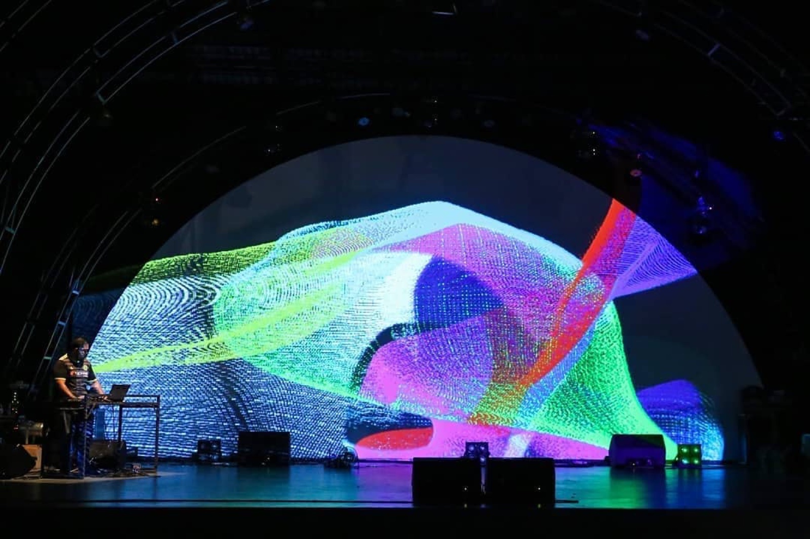 Matrix Studies performed live, generative visuals projected on a large curved screen.
